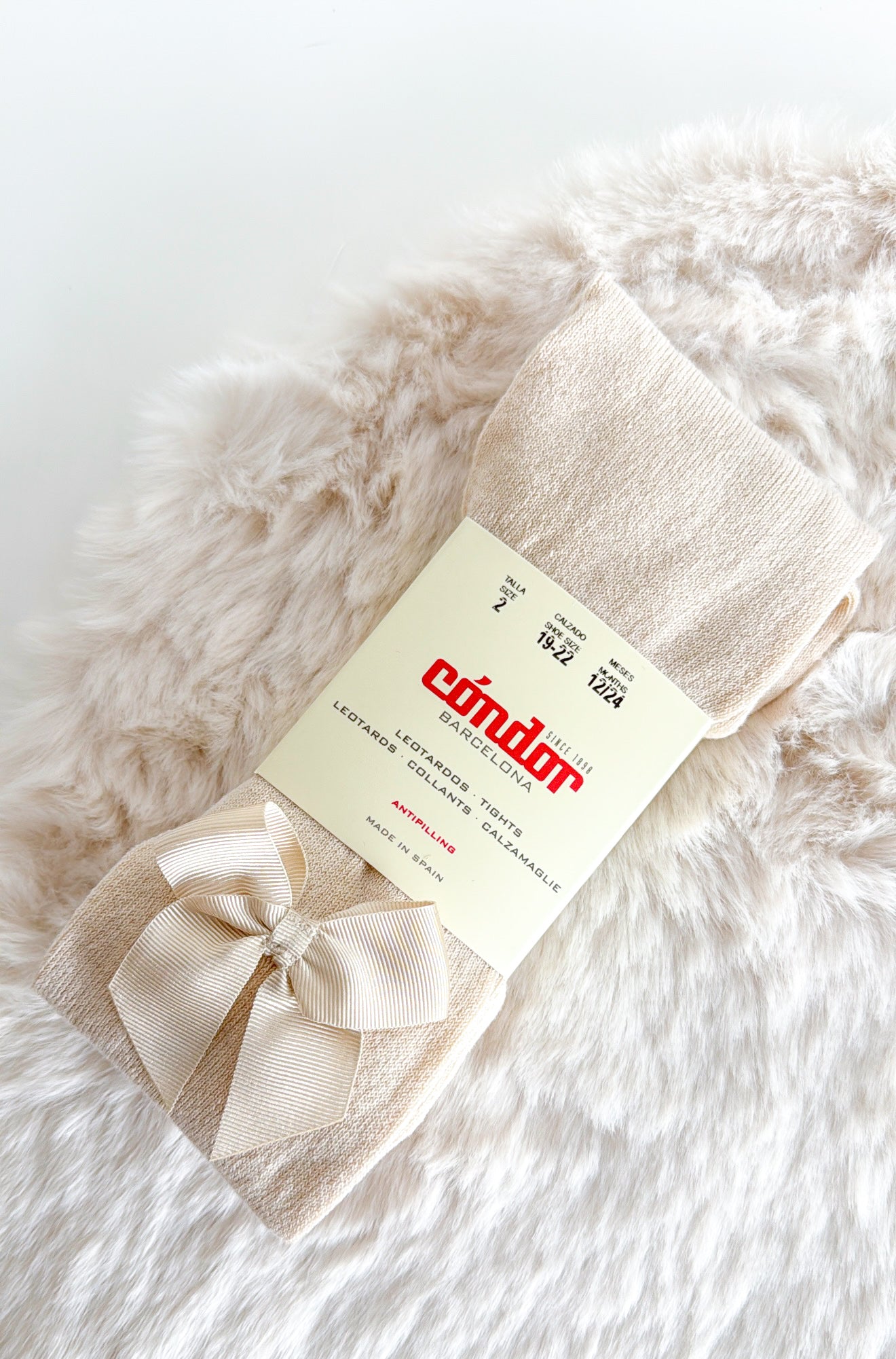 CÓNDOR | KOUSENBROEK MET STRIK BEIGE