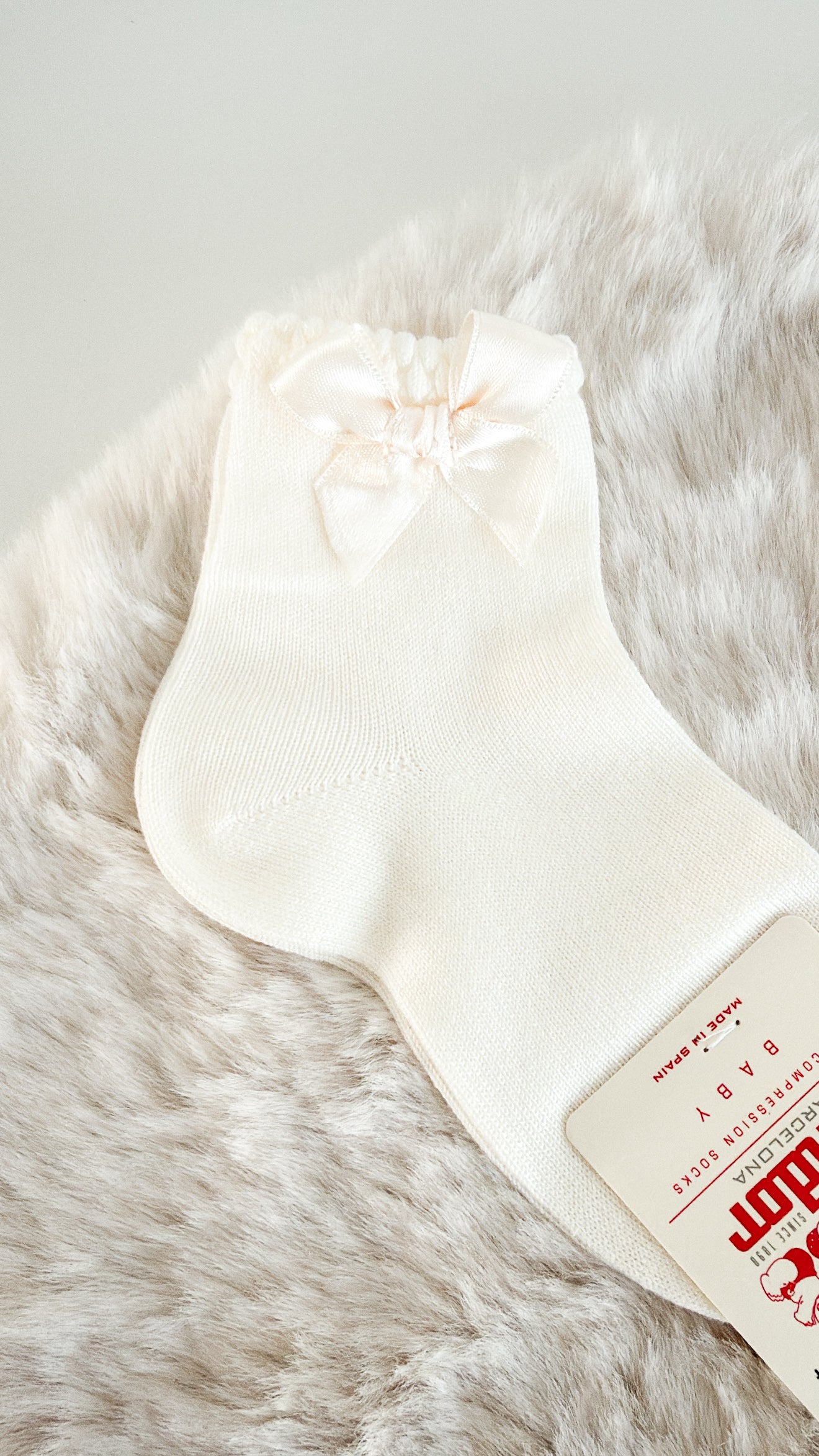 CÓNDOR | ENKELKOUS MET SATIJNEN STRIK CAVA