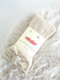 CÓNDOR | KOUSENBROEK MET VELVET STRIK ZAND BEIGE